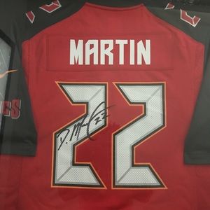 Signed and framed autograph jersey by  Doug Martin